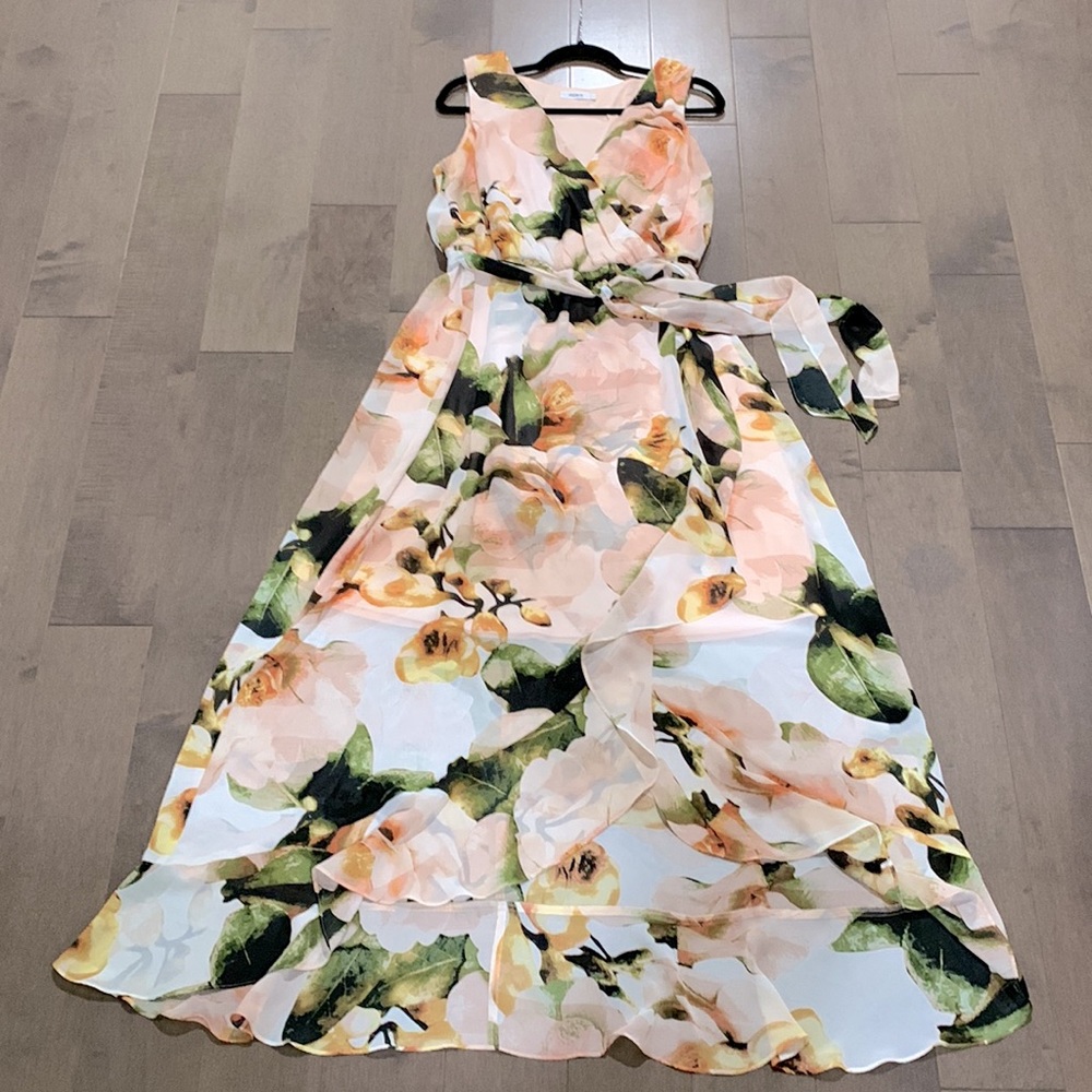 Ricki’s, light pink floral dress, with elastic waist and detachable sash size:14
